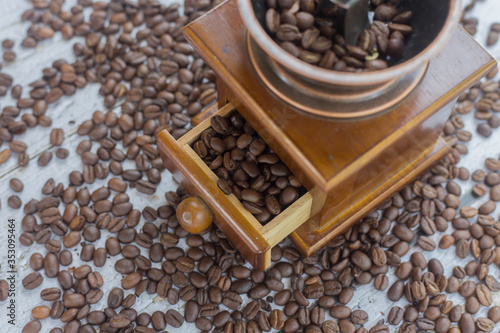 coffee beans in a wooden scoop