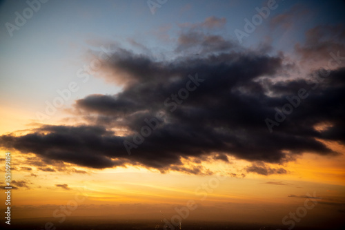 Colorful dawn / dusk sky with dark clouds