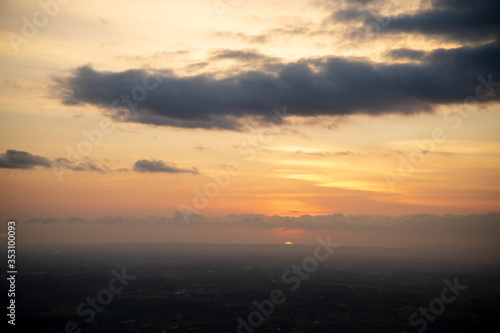 Colorful dawn / dusk sky with dark clouds