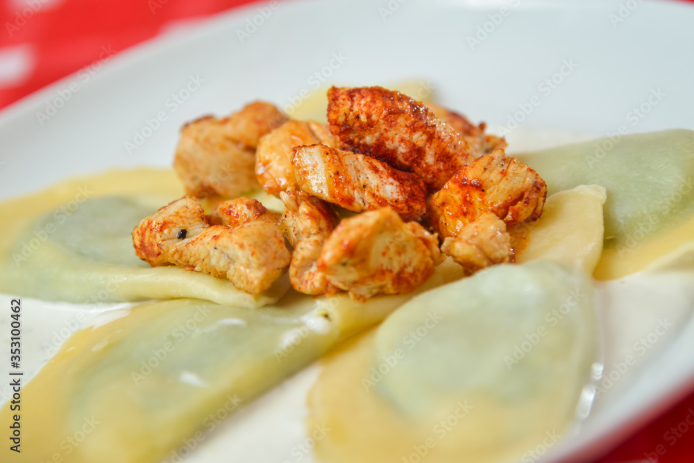 Pasta with Grilled Chicken on white plate Pasta with Grilled Chicken on white plate