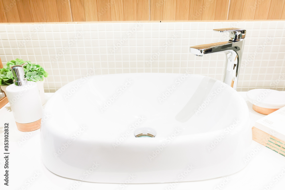 Bathroom interior with sink and faucet Bathroom interior with sink and faucet
