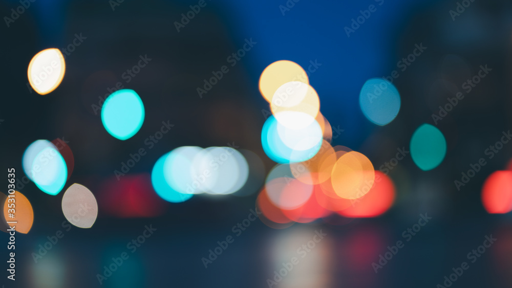 Fototapeta premium Night traffic light bokeh on road