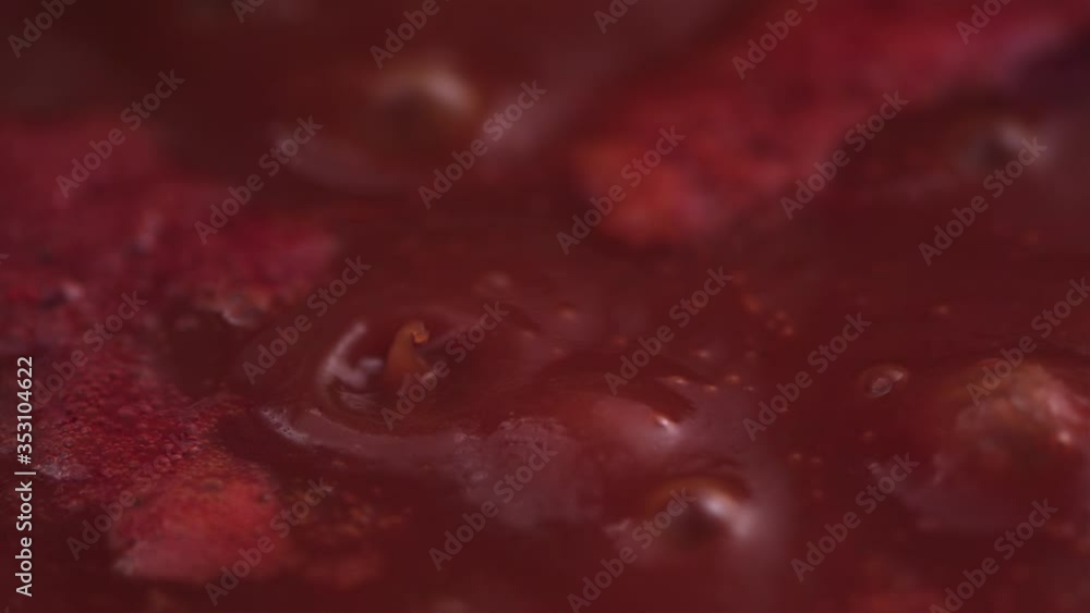 Tomato sauce boiling slow motion Tomato sauce boiling slow motion