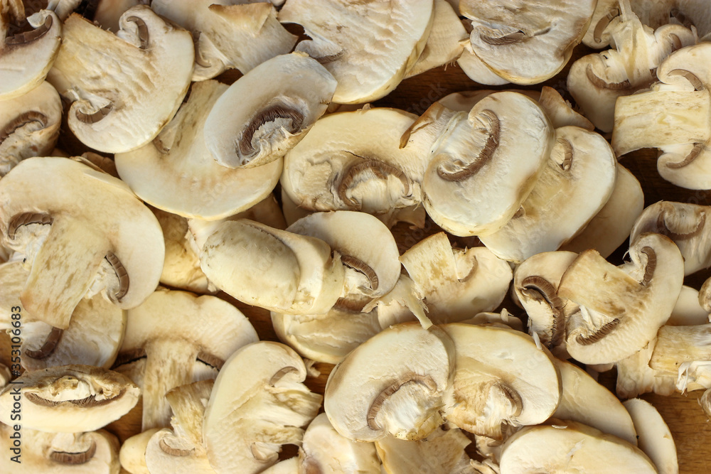 Mushrooms cut on a cutting Board Mushrooms cut on a cutting Board