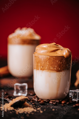 Still life of creamy corean dalgona coffee with coffee beans
