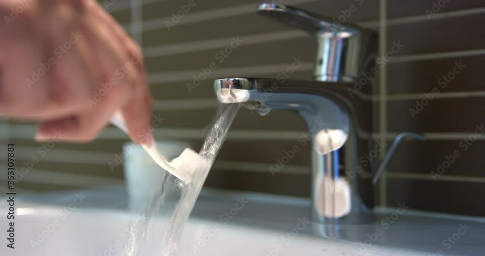 4K Extreme Close Up Shot Of Rinsing Toothbrush With Water In Bathroom 4K Extreme Close Up Shot Of Rinsing Toothbrush With Water In Bathroom