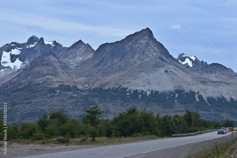 Naklejka premium Ushuaia, City at the End of the World, Argentina. This is place is full of mountains and rivers and snow around the city center, and the city center is a little town, look like more a village than a c