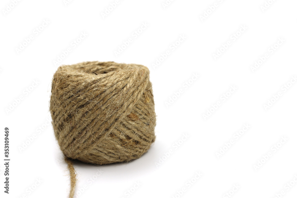 Skein, tangle of jute twine isolated on a white background Skein, tangle of jute twine isolated on a white background