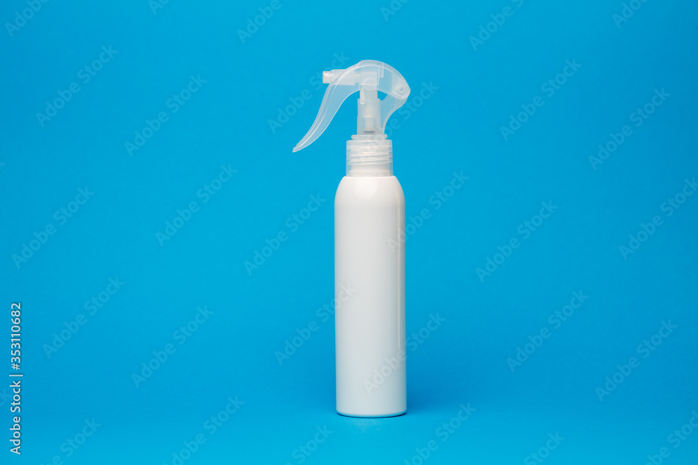 white bottle with cream, hair shampoo, shower gel, isolated blue background, human body beauty white bottle with cream, hair shampoo, shower gel, isolated blue background, human body beauty