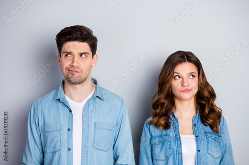 Portrait of pensive unaware spouses fellows look copyspace think thoughts decide freelance decisions choose choice solution wear casual style outfit isolated over gray color background