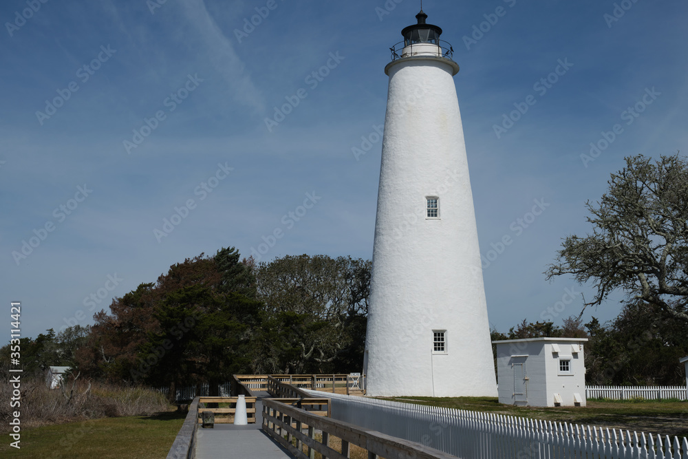 Ocracoke Island historic Lighthouse in the Cape Hatteras National Seashore at sunset, Outer Banks, North Carolina, USA Ocracoke Island historic Lighthouse in the Cape Hatteras National Seashore at sunset, Outer Banks, North Carolina, USA