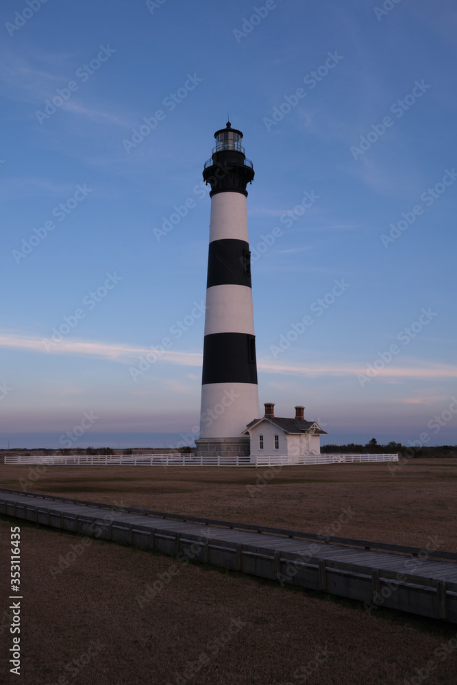 Bodie Island historic Lighthouse in the Cape Hatteras National Seashore at sunset, Outer Banks, North Carolina, USA Bodie Island historic Lighthouse in the Cape Hatteras National Seashore at sunset, Outer Banks, North Carolina, USA