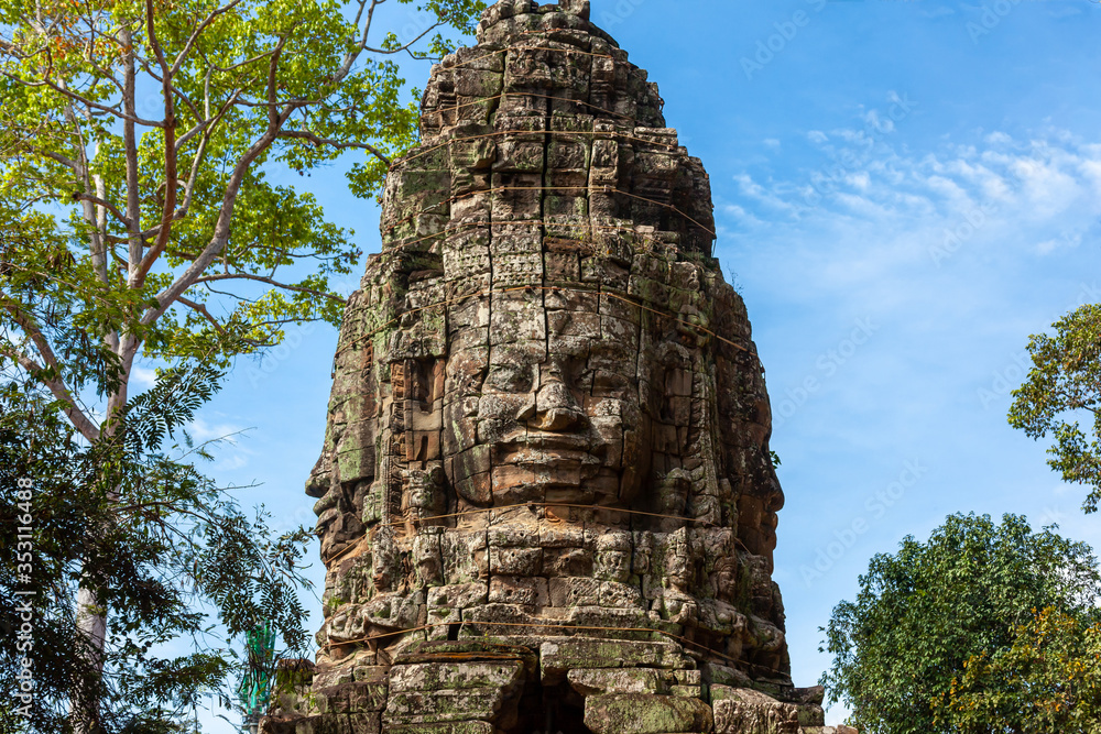 Face Stone sculptures  of ancient Bayon Temple At Angkor Wat in Siem Reap  Cambodia
