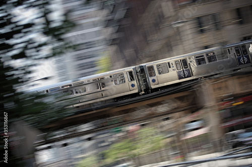 The Loop, essential vital energy supplier and pillar of public transportation, moving like a fast stream accross Chicago downtown buildings
