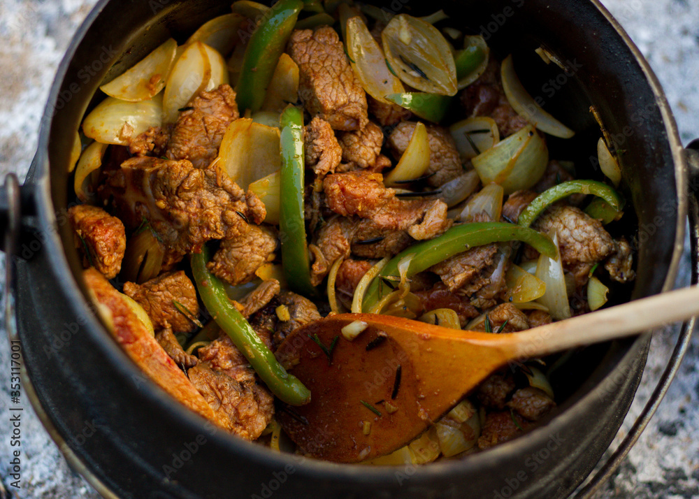 Foto de Beef Curry Potjie on the braai do Stock Adobe Stock