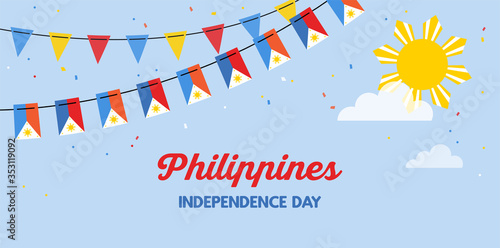 Philippines flags bunting waving on the blue sky background. banner for independence day. Background for greeting Card, Poster, Web Banner Design.