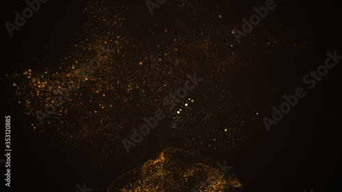 Pile of gold powder on black background with gold particles falling on this pile.