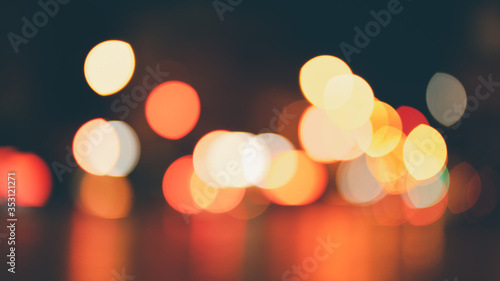 Abstract bokeh lights defocused on black background