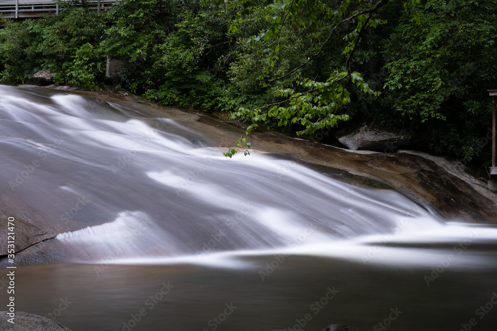 Obraz premium Sliding Rock, a popular waterfall and destination in Brevard, near Asheville, North Carolina in the Blue Ridge Mountains