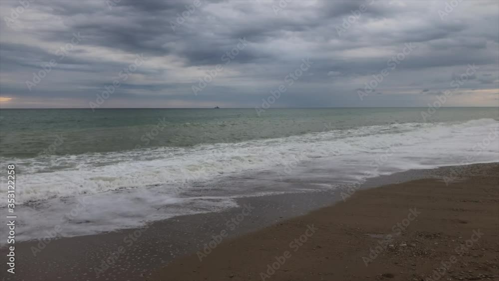Storm in the sea overcast sky sandy beach Storm in the sea overcast sky sandy beach
