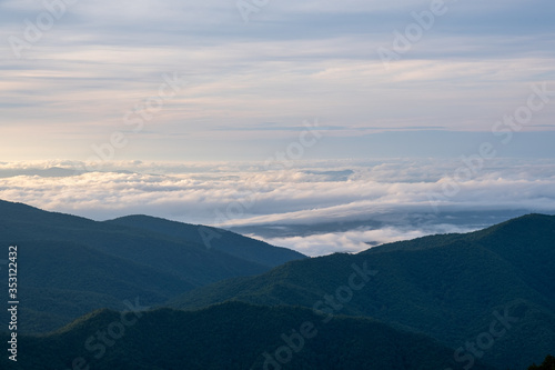 Scenic sunrise view of the Blue Ridge Mountains near Asheville  North Carolina from the Blue Ridge Parkway  a scenic byway stretching across the mountains of western NC.