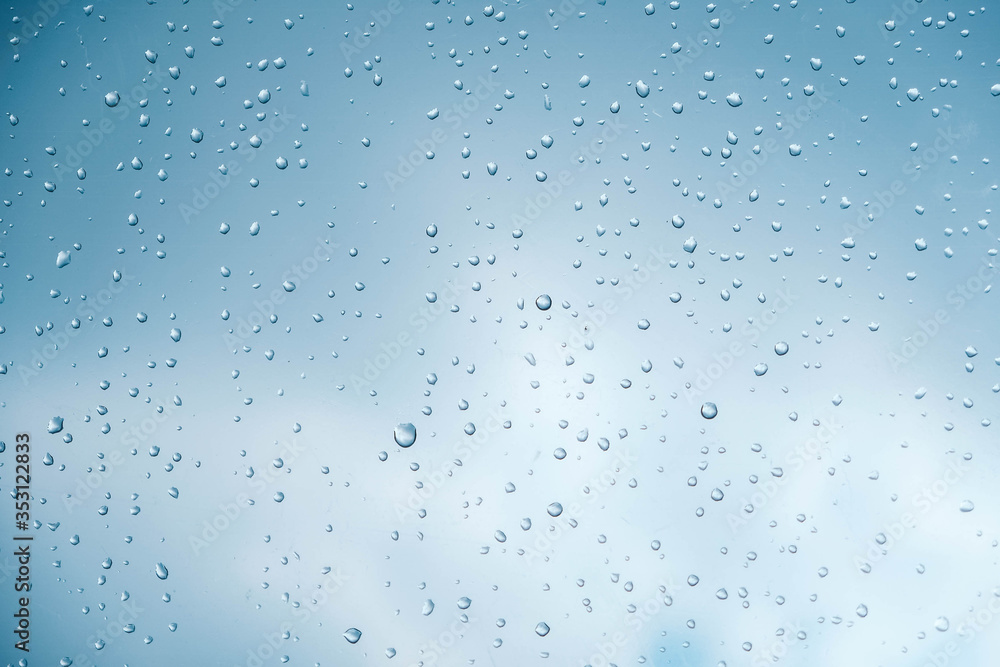 Water drops on a transparent polythene after a rain as a background image. Top view. Copy, empty space for text Water drops on a transparent polythene after a rain as a background image. Top view. Copy, empty space for text