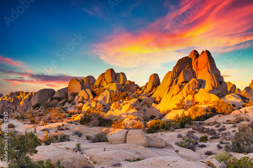 Rocks in Joshua Tree National Park illuminated by sunset  Mojave Desert  California