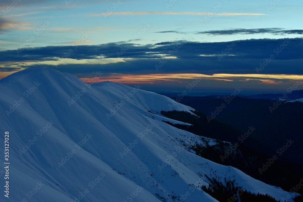 colorfully clouds at sunset in top of the mountain on winter time at high altitudes colorfully clouds at sunset in top of the mountain on winter time at high altitudes