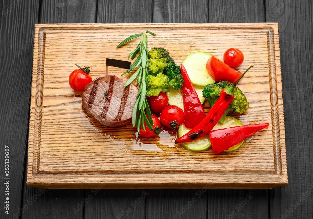 Grilled bbq steak with potato cube and tomatoes. Grilled bbq steak with potato cube and tomatoes.