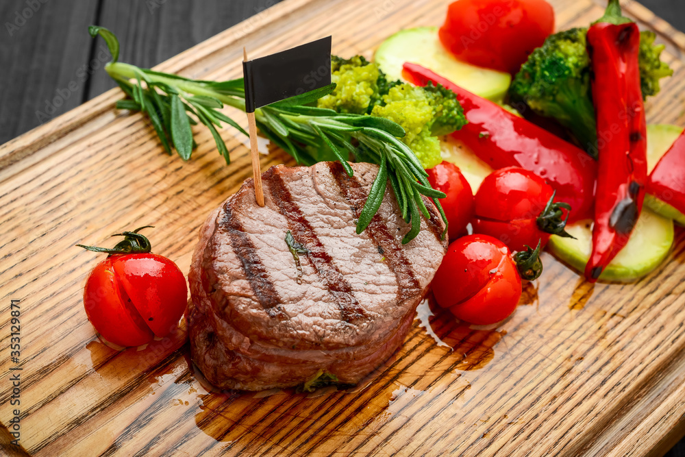 Grilled bbq steak with potato cube and tomatoes. Grilled bbq steak with potato cube and tomatoes.
