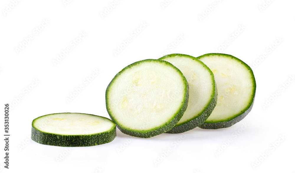 slice fresh zucchini with slice on white background slice fresh zucchini with slice on white background