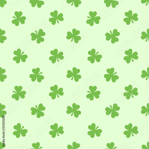 Seamless pattern with cute small three-leaf clover leaves. St. Patrick s day vector illustration with shamrock.