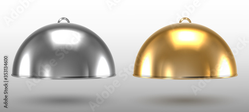 Silver and gold restaurant cloche on a white background