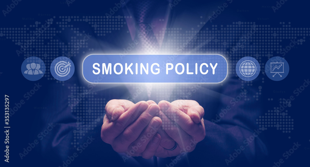 Businessmans cupped hands holding an Smoking Policy business concept on a computerised display. Businessmans cupped hands holding an Smoking Policy business concept on a computerised display.