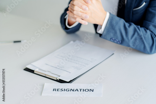 Man with resignation letter for quit a job.