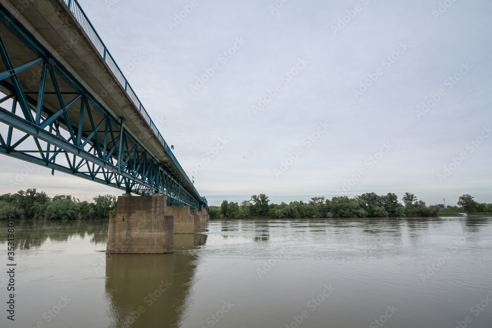 Steel bridge crossing the Sava river between Brcko and Gunja, at the border between Bosnia and Herzegovina and Croatia, an official border crossing of the European Union (EU) Steel bridge crossing the Sava river between Brcko and Gunja, at the border between Bosnia and Herzegovina and Croatia, an official border crossing of the European Union (EU)