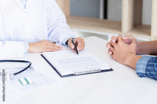 Medicine doctor consultant explaining to patient about problem diagnosis.