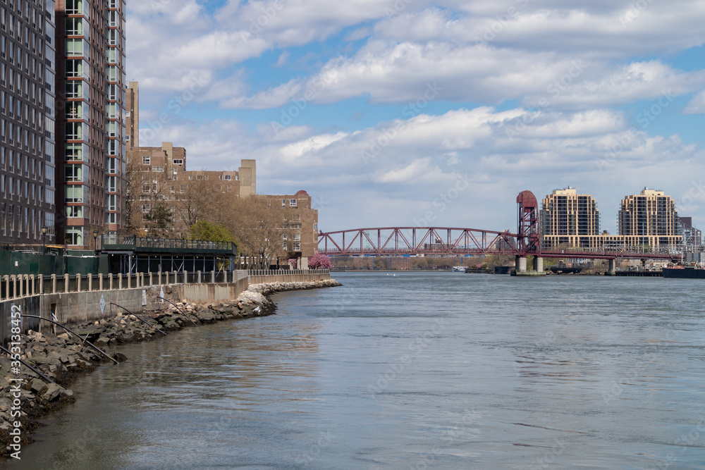 The East River with the Roosevelt Island Bridge between Roosevelt Island and Astoria Queens New York