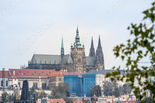Panorama of the Old Town of Prague, Czech Republic, with a focus on Hradcany hill and the Prague Castle with the St Vitus Cathedral (Prazsky hill) seen from the Vltava river.