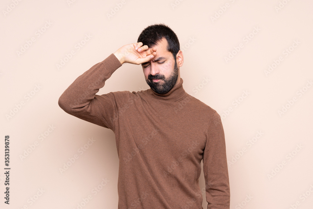 Man over isolated background with tired and sick expression Man over isolated background with tired and sick expression