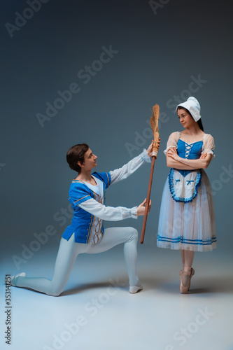 Canvas Print Young and graceful ballet dancers as Cindrella fairytail characters on studio background