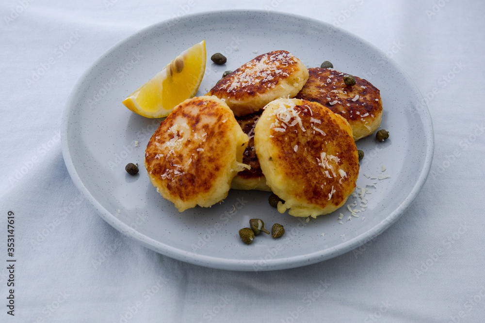 Potato Parmesan Pancakes with lemon and capers