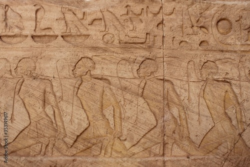 Wall carving showing war prisoners in Abou simbel temple in Aswan