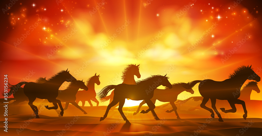 Fototapeta premium A running or stampeding herd of wild horses in silhouette with a sunset or sunrise in the background