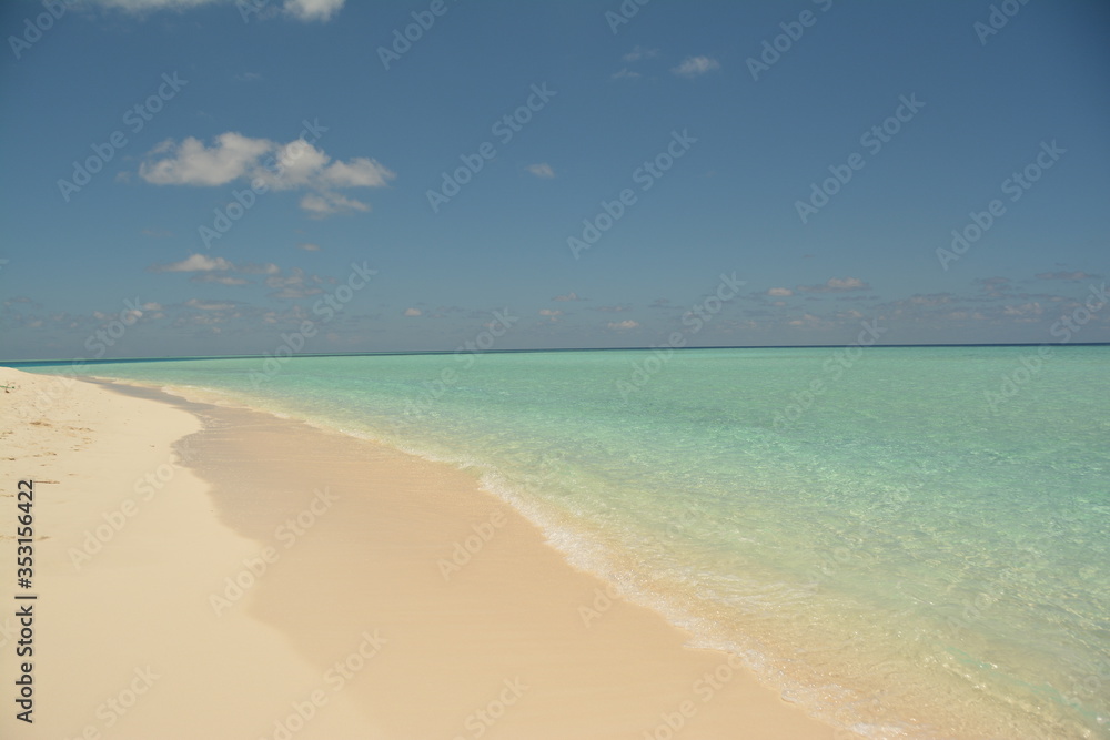 Tropical beach with white sand. Maldives. For wallpaper design. Summer beach sky.