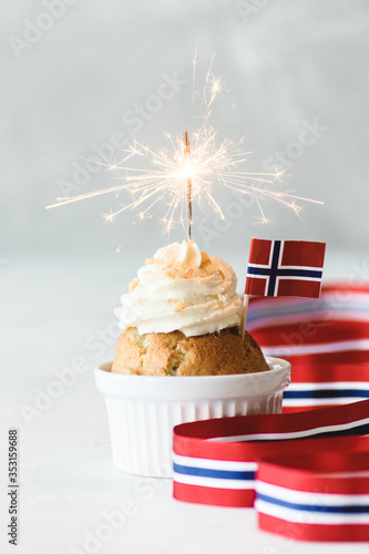 Muffin with candle and norwegian flag