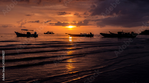 sunset at the beachof koh tao island photo
