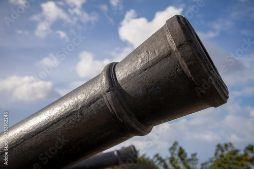 A canon barrel at Fort Soledad Park symbolically protects the tropical island US Territory of Guam, Micronesia. photo