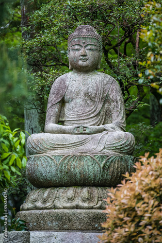 Statue of Buddha in the Gardens at Ryoanji, Kyoto, Japan