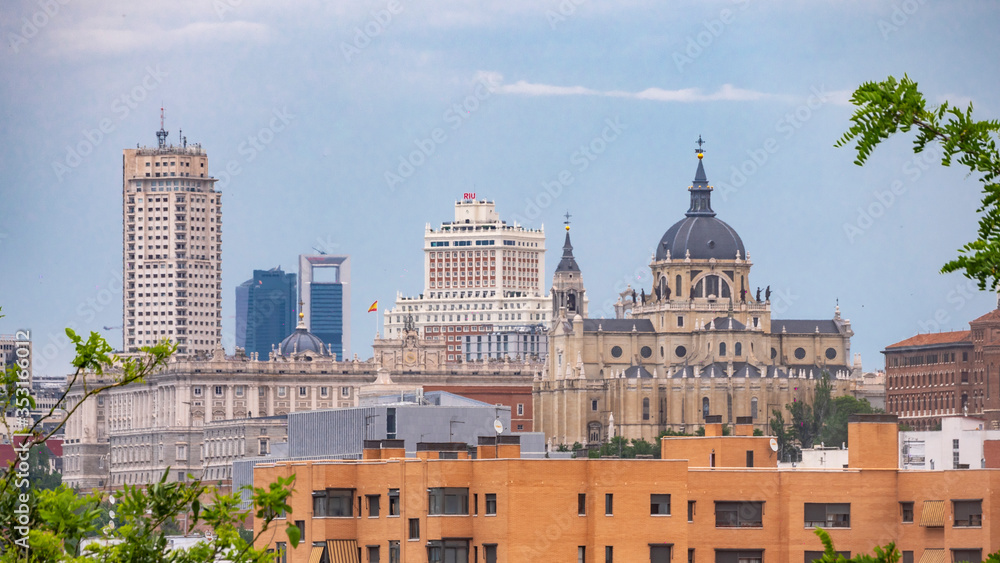 MADRID, SPAIN - APRIL 20, 2020: SKYLINE OF MADRID WITHOUT CONTAMINATION DURING COVID-19. ROYAL PALACE, SPAIN SQUARE BUILDING, TOWER MADRID AND FINANCIAL DISTRICT TOWERS